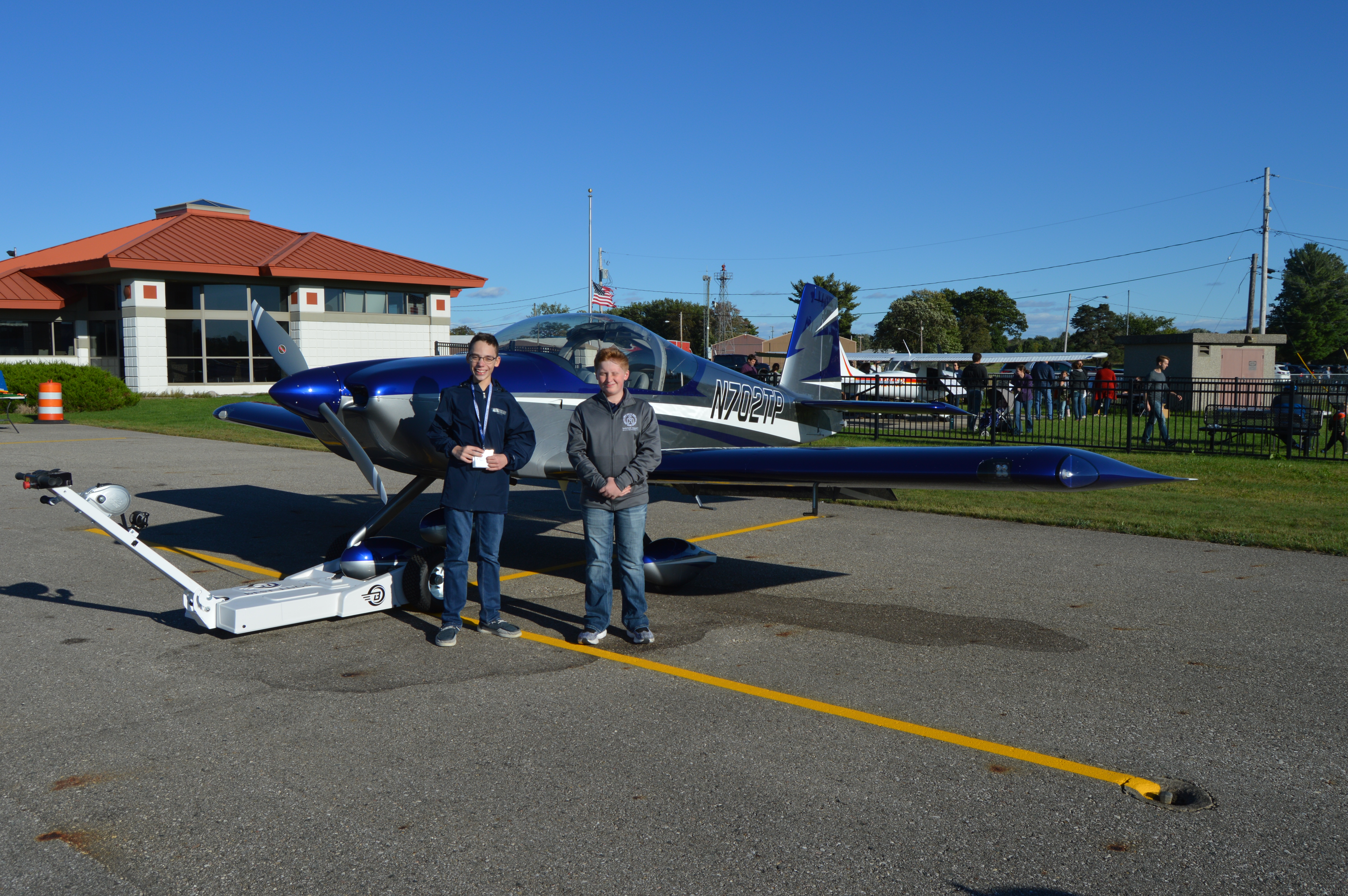 CSO Students standing in front of airplane